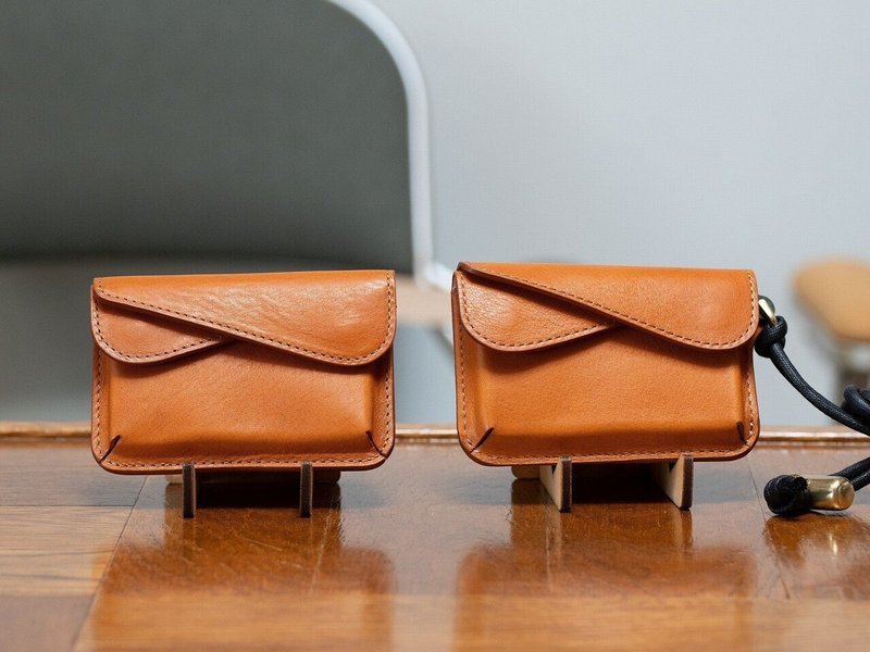 Leather wallets on stands